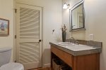 Powder bath with second set of washer and dryer in closet, upper level